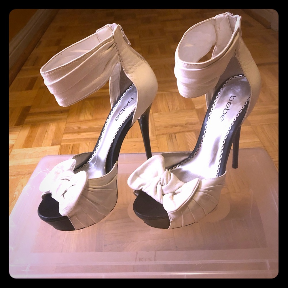 White leather Bebe bow tie heels